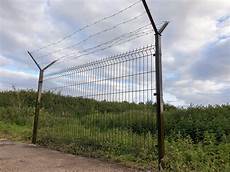 Curved-Barb Panel Fence